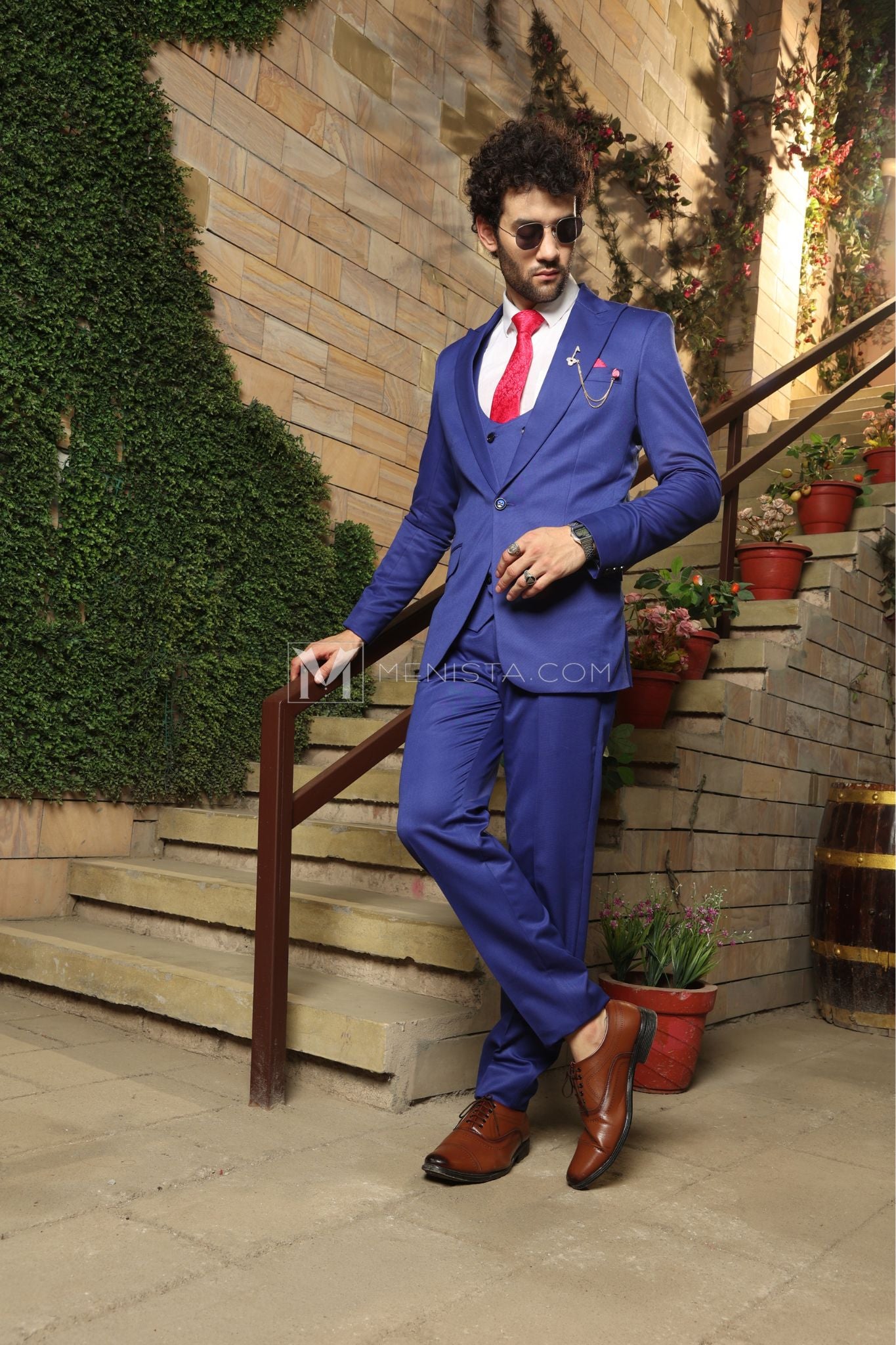 royal blue suit with a red shirt