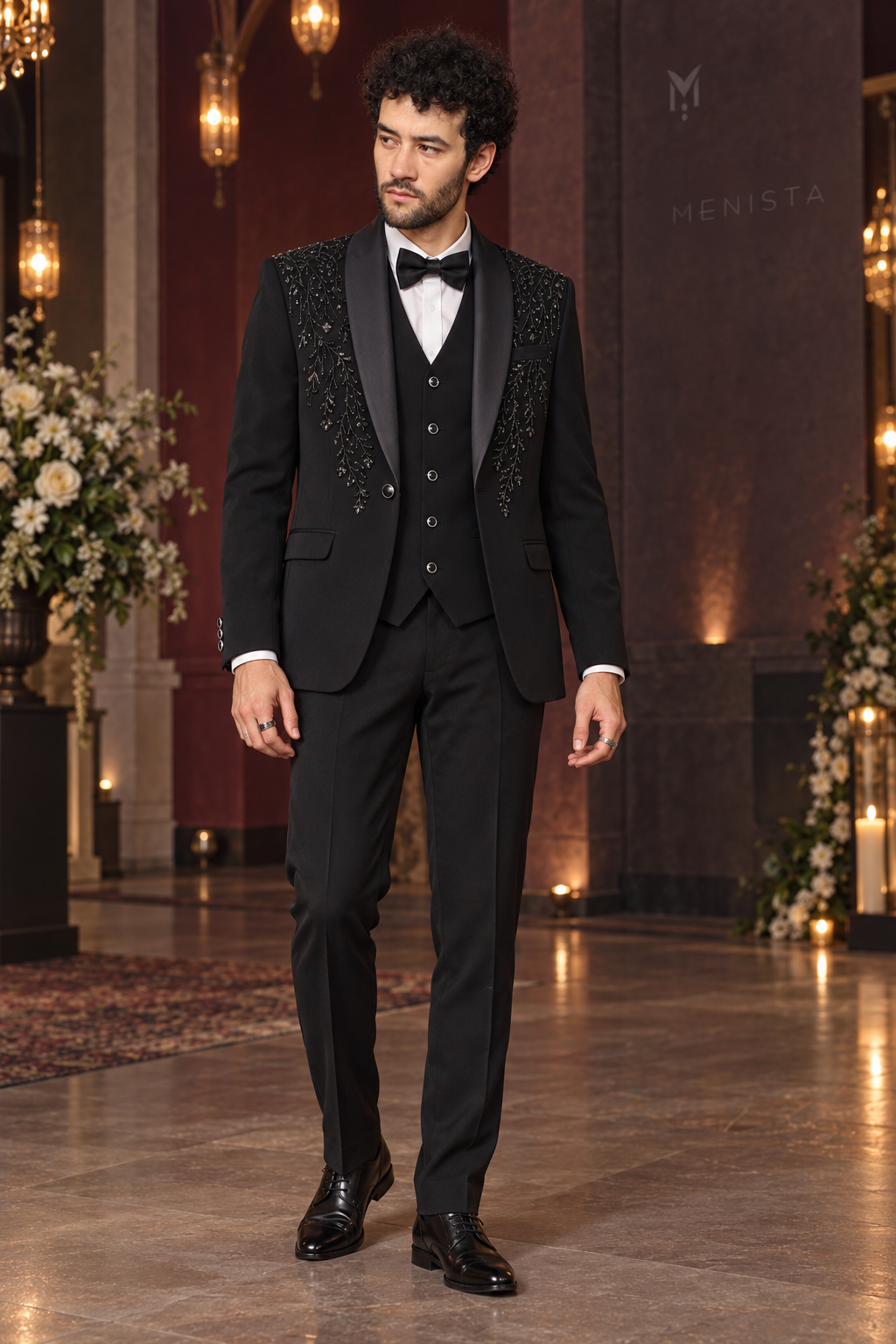 Michael wearing Cyran Black Botanical Beaded 3PC Tuxedo, full front view with a simple five-button waistcoat.