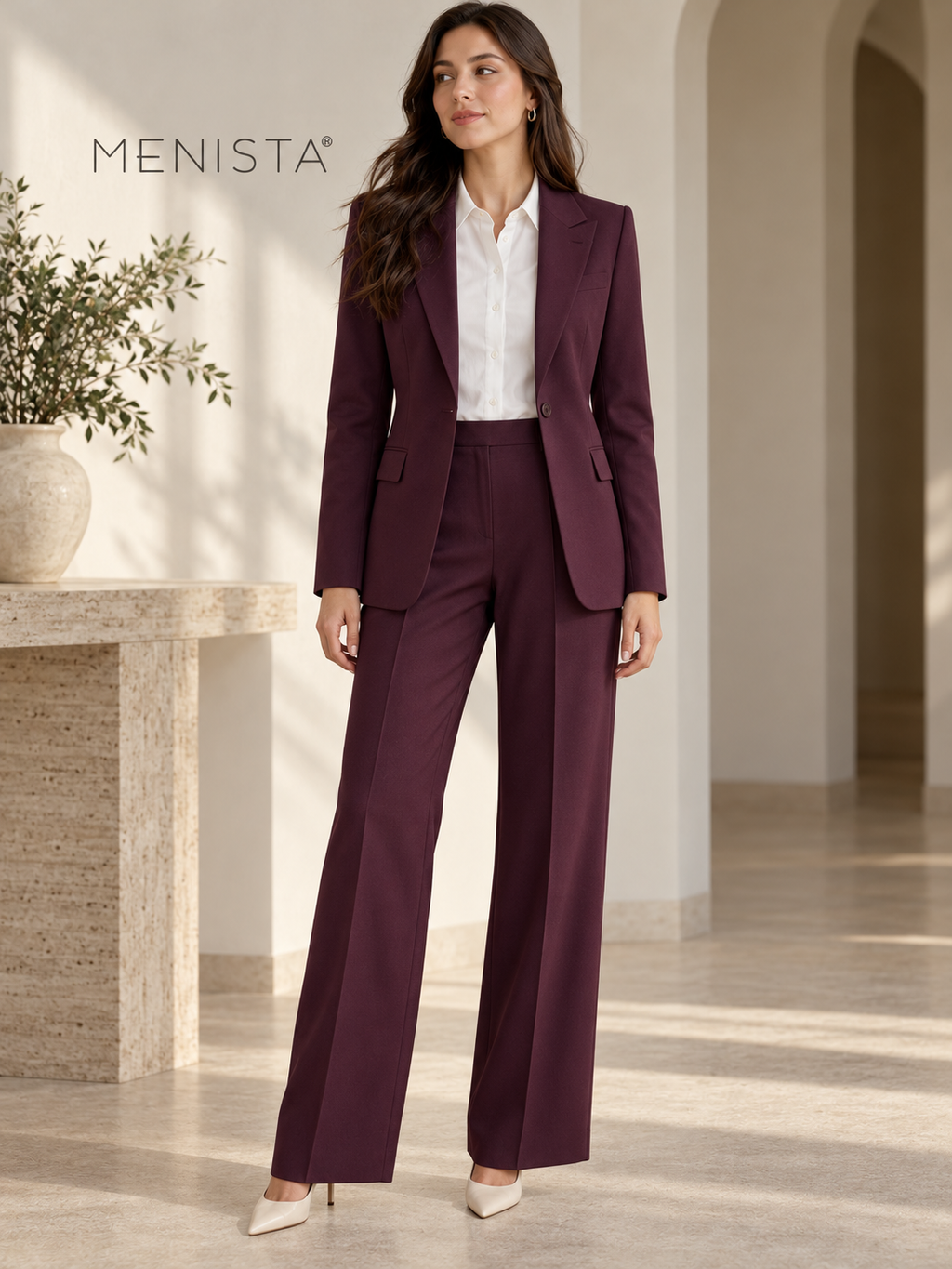 Full front view of women’s deep plum single-button jacket and matching wide-leg trousers.