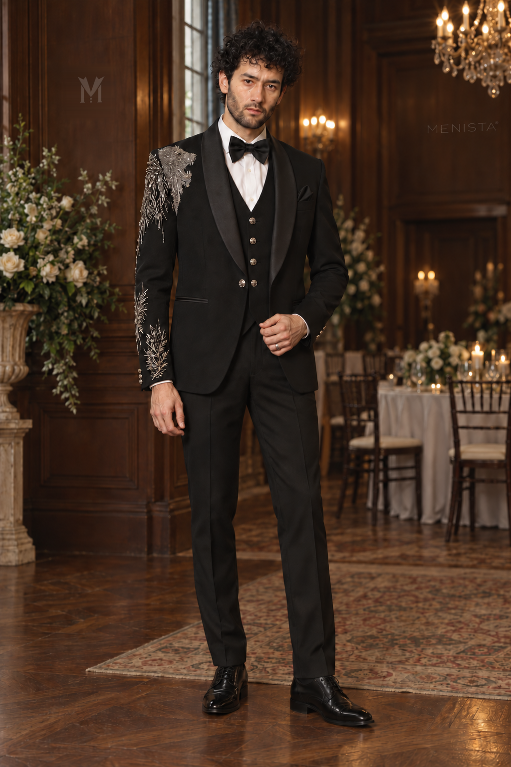 Michael wearing Leonis black lion embroidered three-piece tuxedo, full-length front view