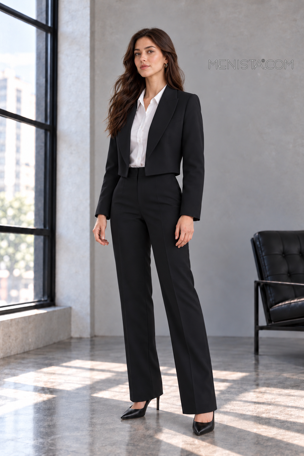 Three-quarter view of Isolde women’s black jacket and trousers.