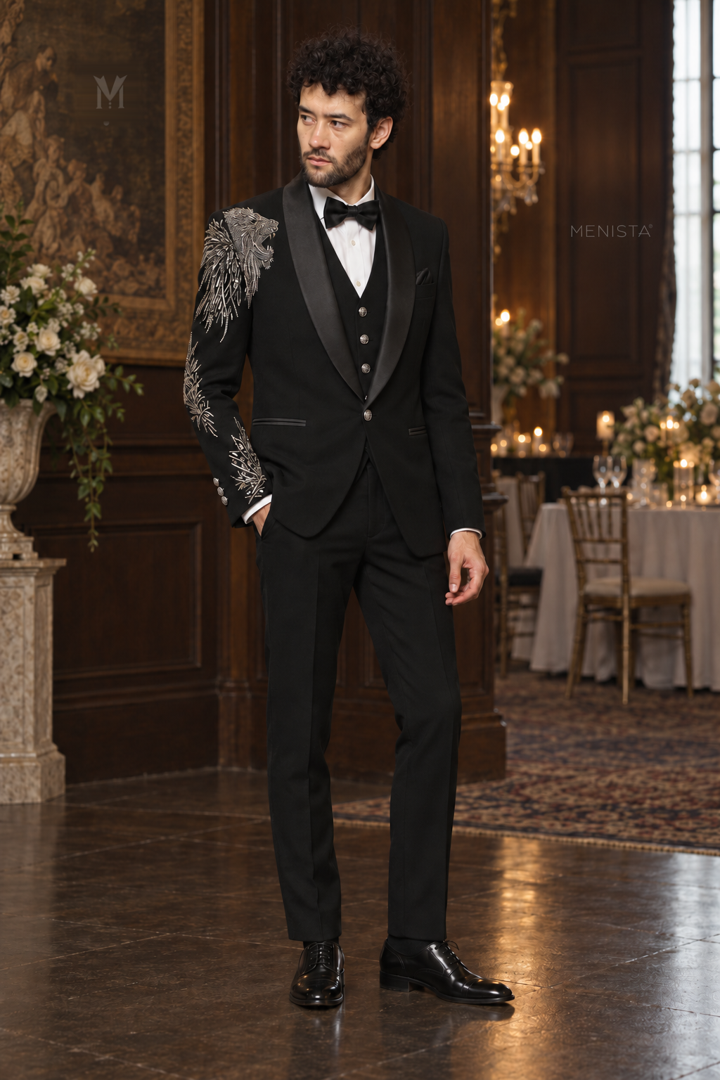 Three-quarter view of Leonis black tuxedo with silver-tone lion bead embroidery