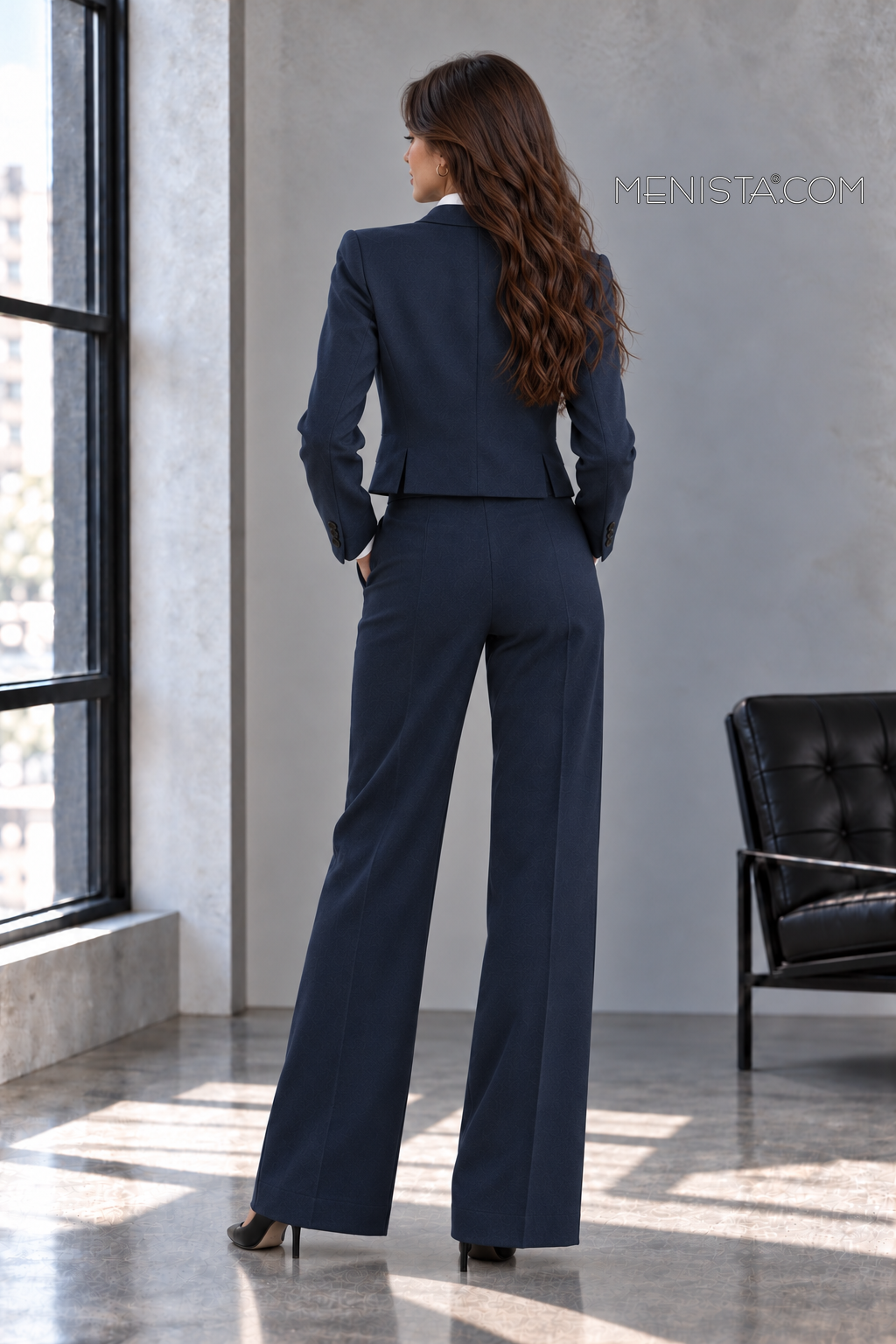 Back view of Calista jacket with twin side vents and matching trousers.