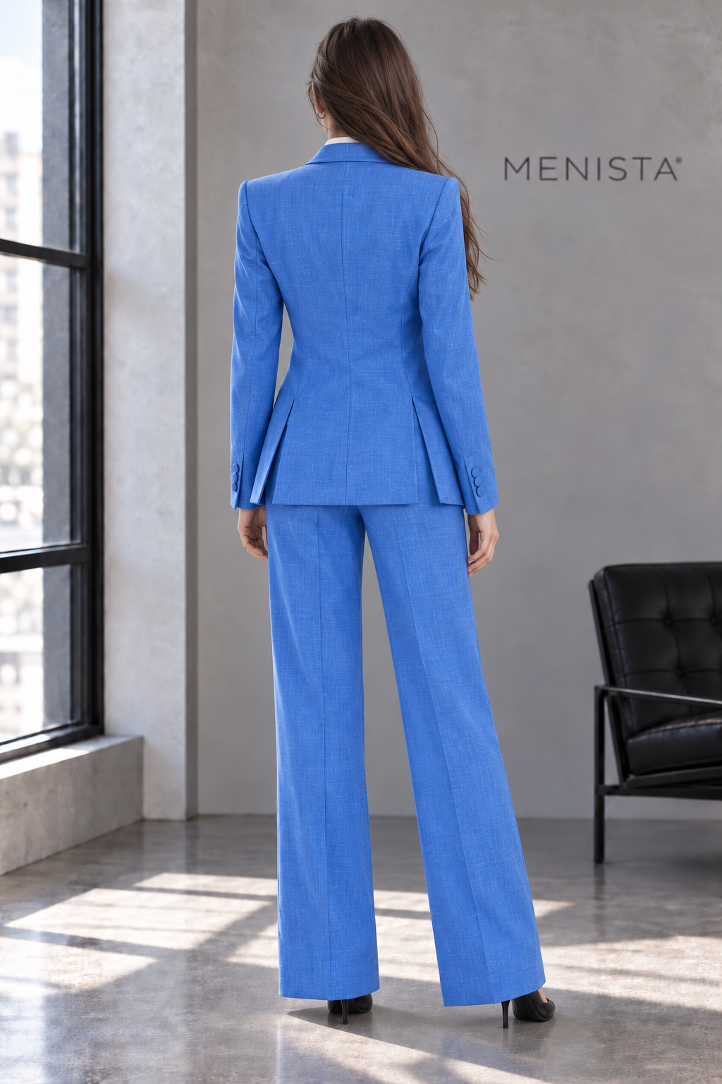 Back view of Leontine jacket with twin side vents and matching trousers.