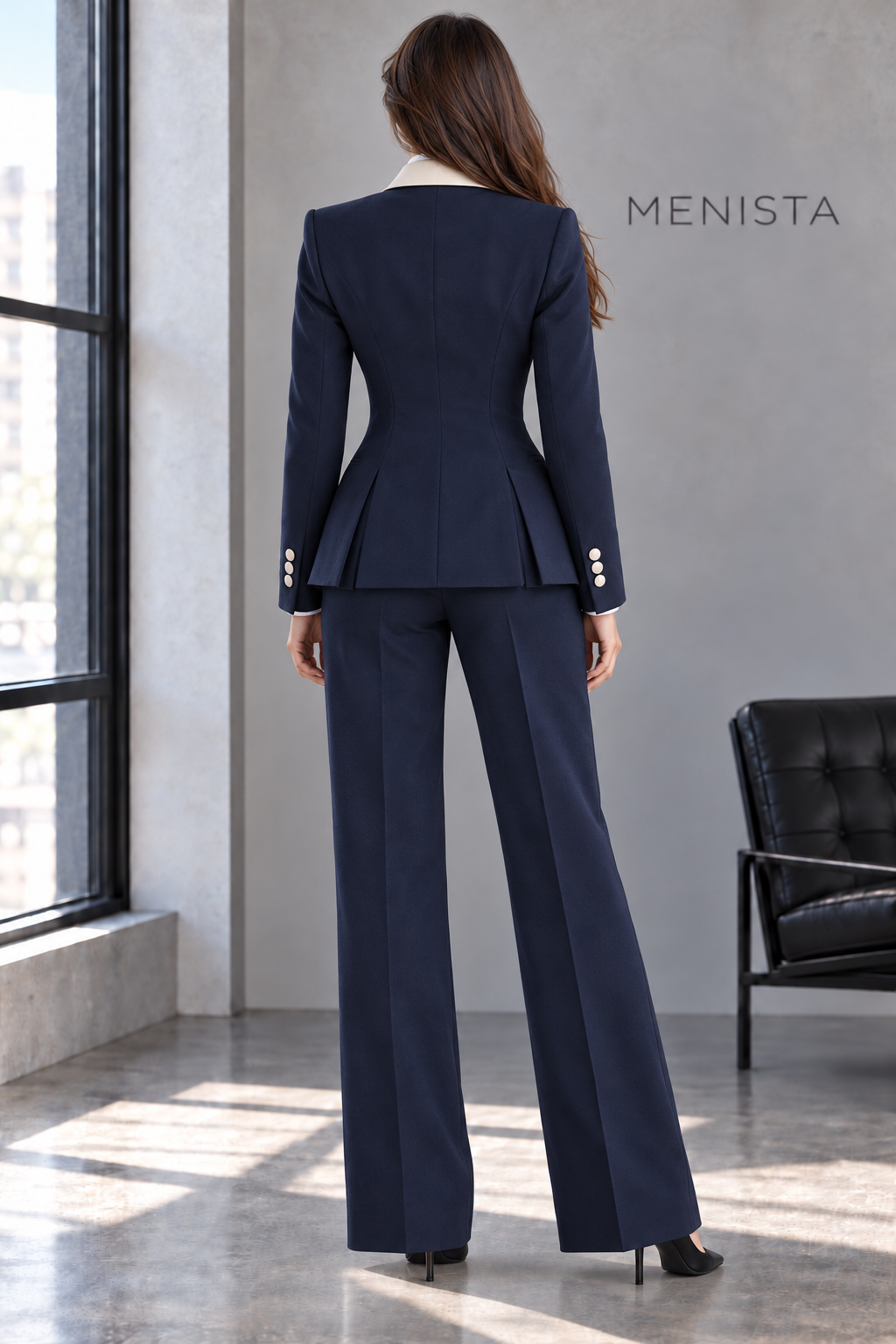 Back view of Marielle jacket with twin side vents and matching trousers.