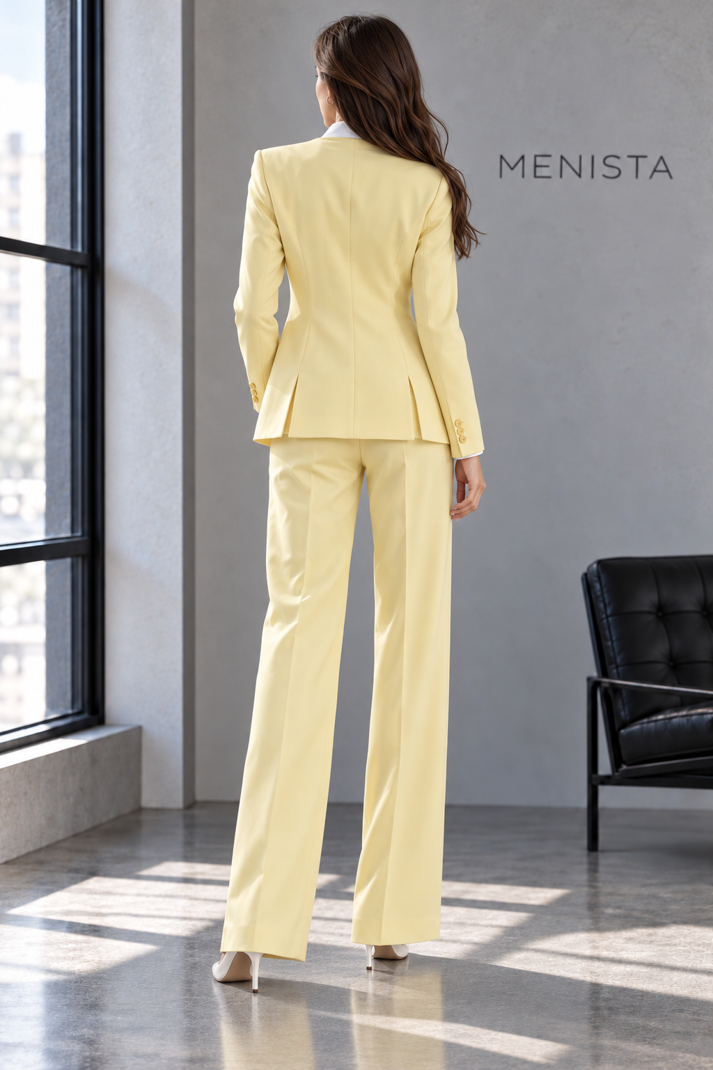 Back view of Rosamund jacket with twin side vents and matching trousers.