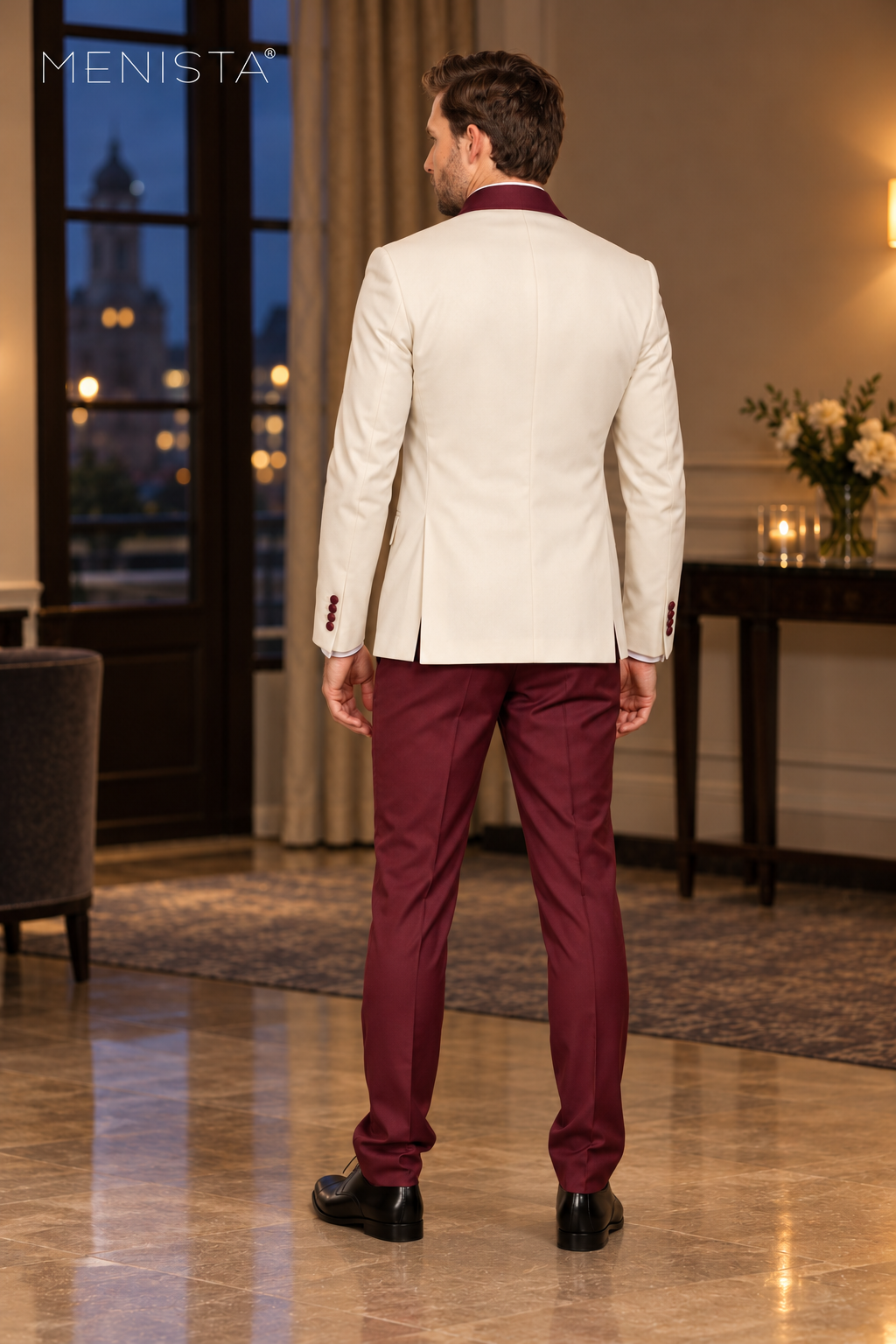 Full back view of Menista ivory jacket with burgundy collar, twin side vents and matching burgundy trousers.