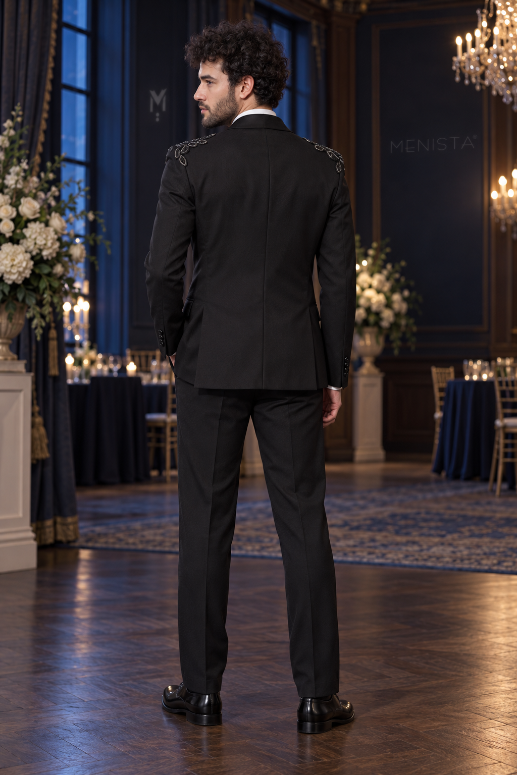 Full back view of Ronan Black Leaf Beaded 3PC Tuxedo with plain trousers and side vents.