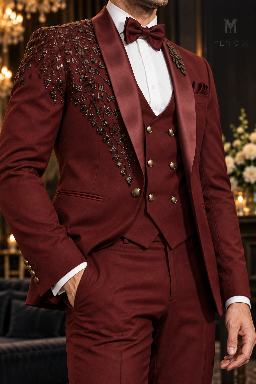 Close-up of Valen burgundy satin shawl lapels, leaf bead embroidery and six-button double-breasted waistcoat.