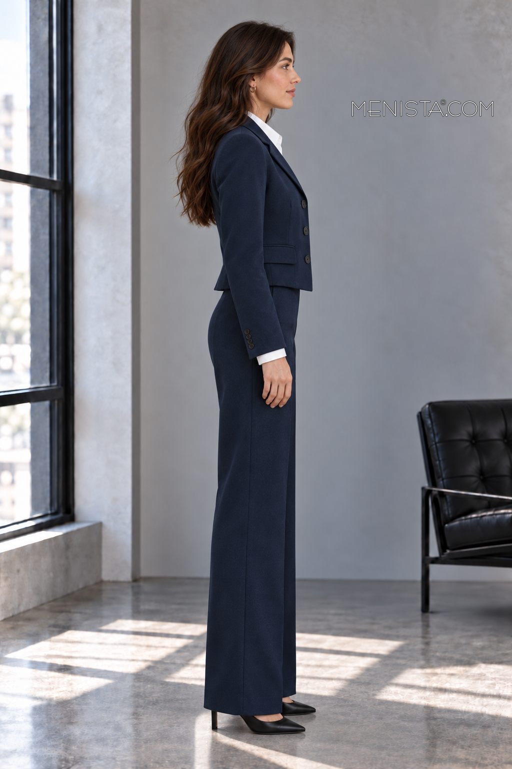Calista navy cropped three-button jacket and matching wide-leg trousers, full-body true side profile on Rose.