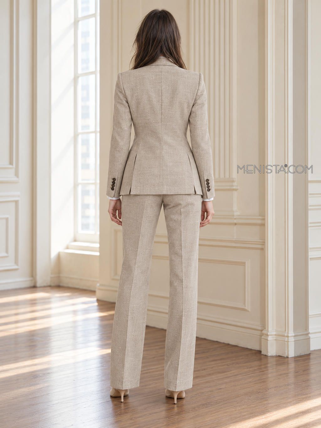 Back of Althea linen jacket showing twin rear vents and matching full-length trousers.