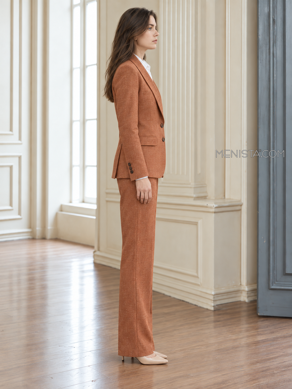 Artemise women’s terracotta linen suit, upright full-body side profile.