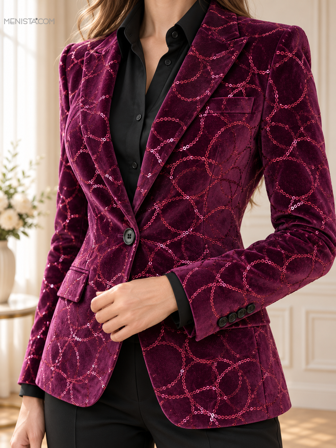 Close-up of purple velvet fabric, overlapping pink sequin circles, notch lapels, one black front button and four cuff buttons.