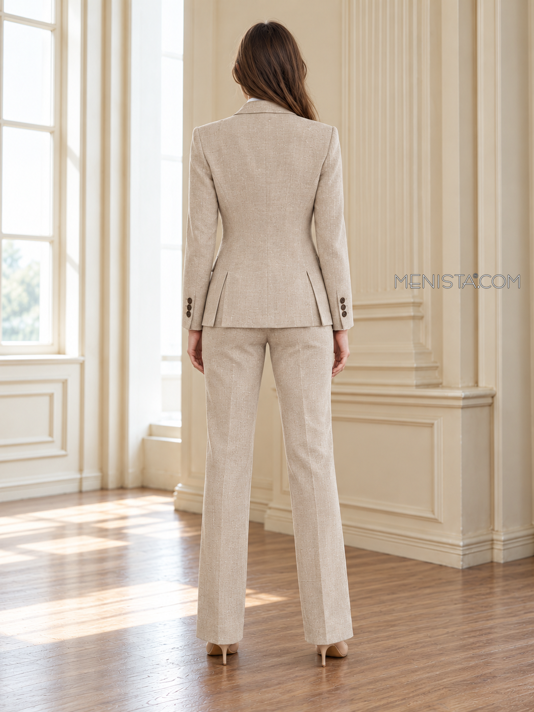 Back of Cyrene linen jacket showing twin rear vents and matching full-length trousers.