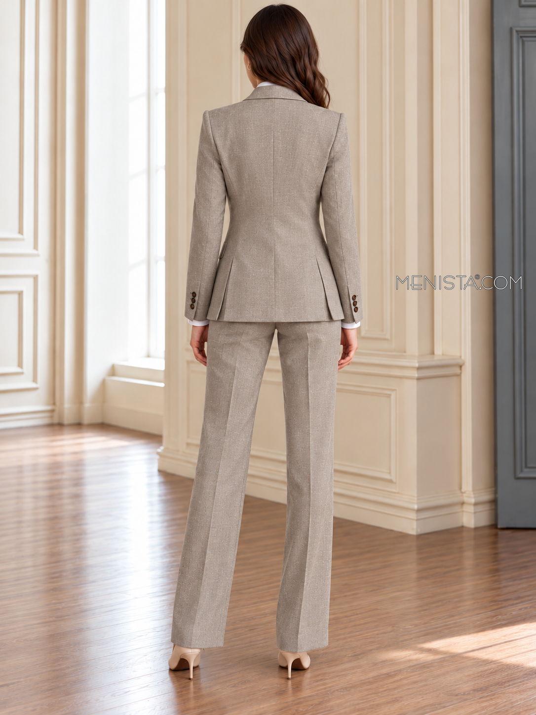 Back of Demetria linen jacket showing twin rear vents and matching full-length trousers.