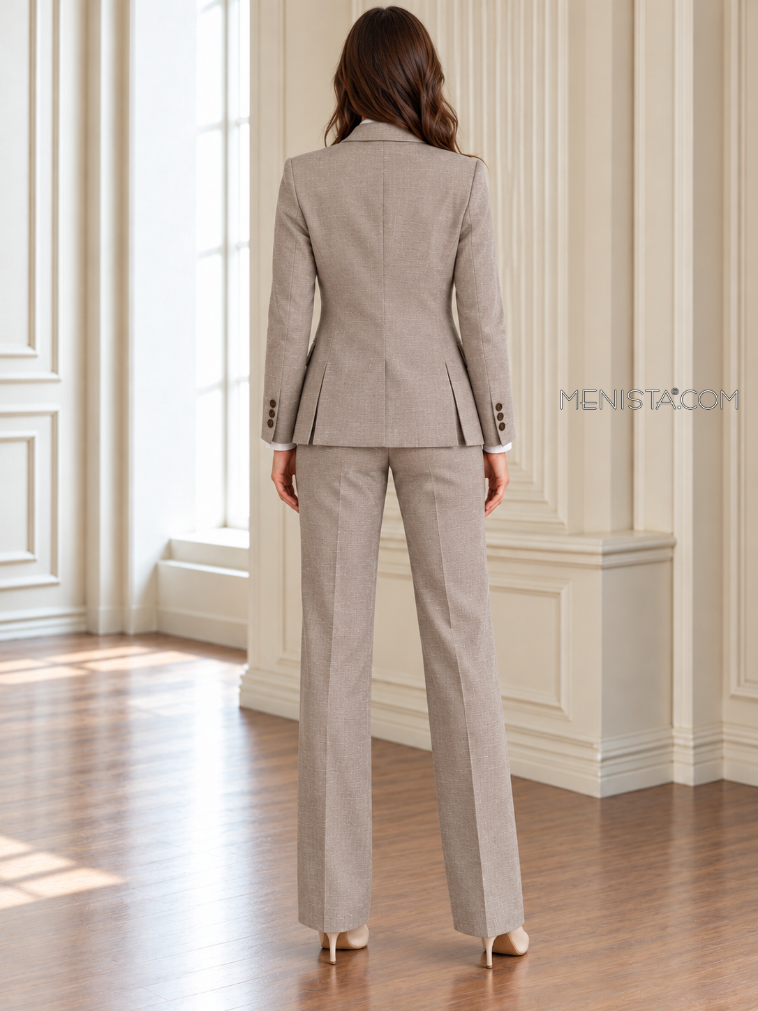 Back of Dulcinea linen jacket showing twin rear vents and matching full-length trousers.