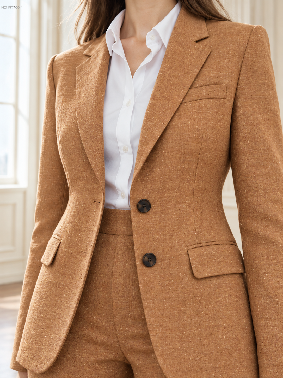 Close-up of Ginevra camel linen jacket with notch lapels and two-button front.