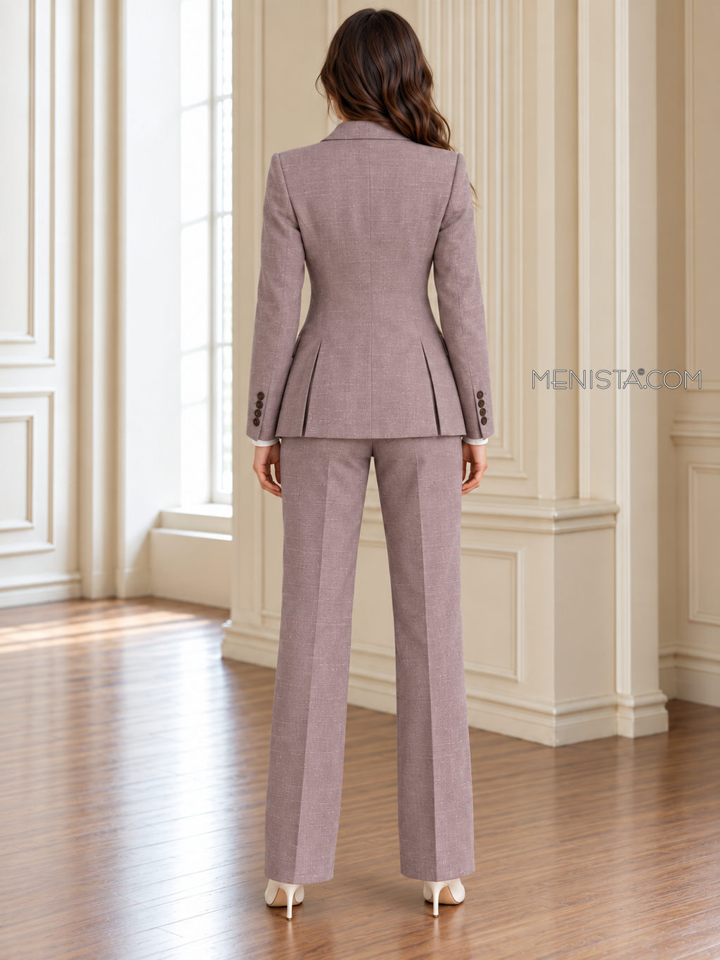Back of Heloise linen jacket showing twin rear vents and matching full-length trousers.