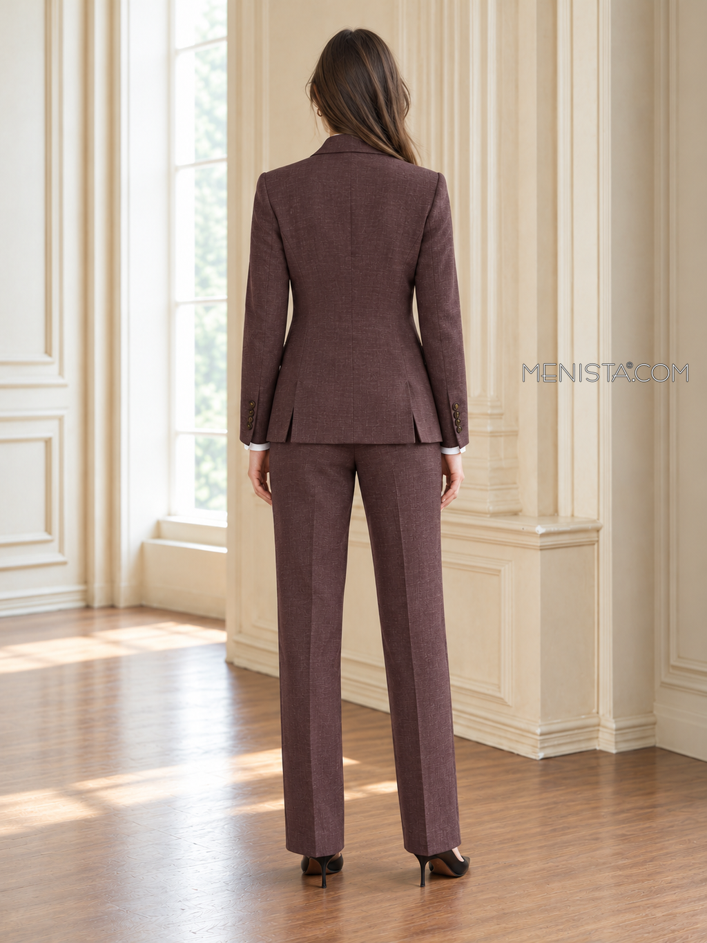 Back of Katriel linen jacket showing twin rear vents and matching full-length trousers.