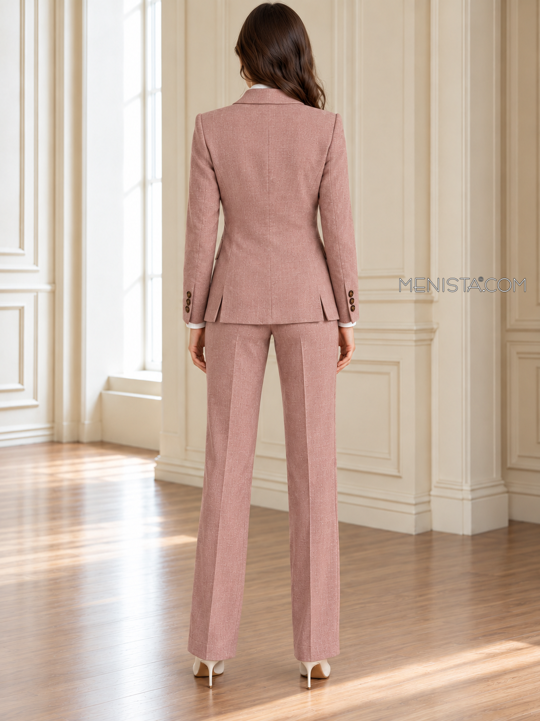 Back of Leonora linen jacket showing twin rear vents and matching full-length trousers.