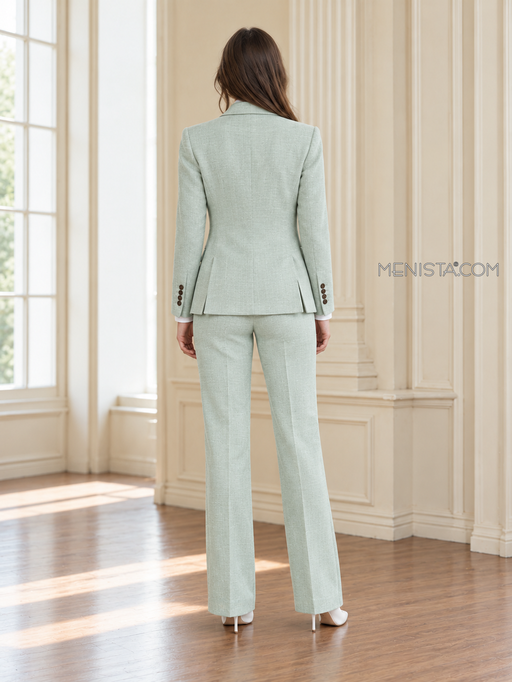 Back of Melisande linen jacket showing twin rear vents and matching full-length trousers.