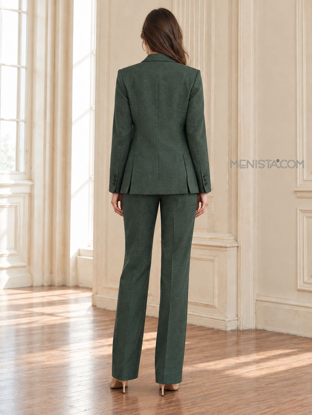 Back of Mirabelle linen suit showing twin rear jacket vents and matching full-length trousers.