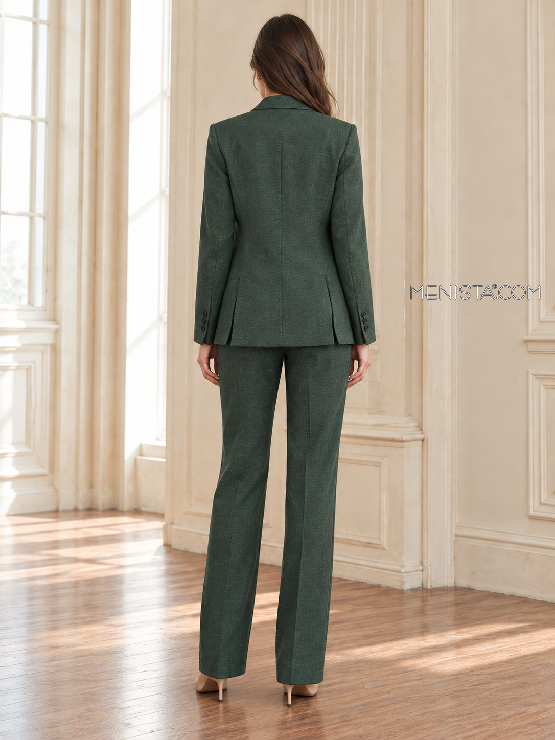Back of Mirabelle linen suit showing twin rear jacket vents and matching full-length trousers.