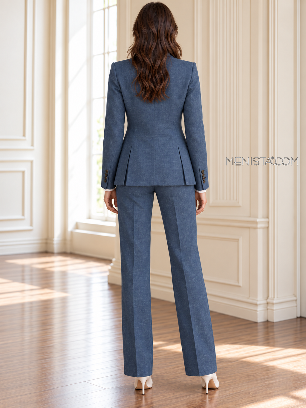 Back of Nimue linen jacket showing twin rear vents and matching full-length trousers.