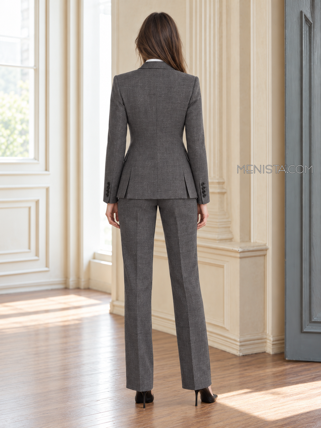 Back of Quintessa linen jacket showing twin rear vents and matching full-length trousers.
