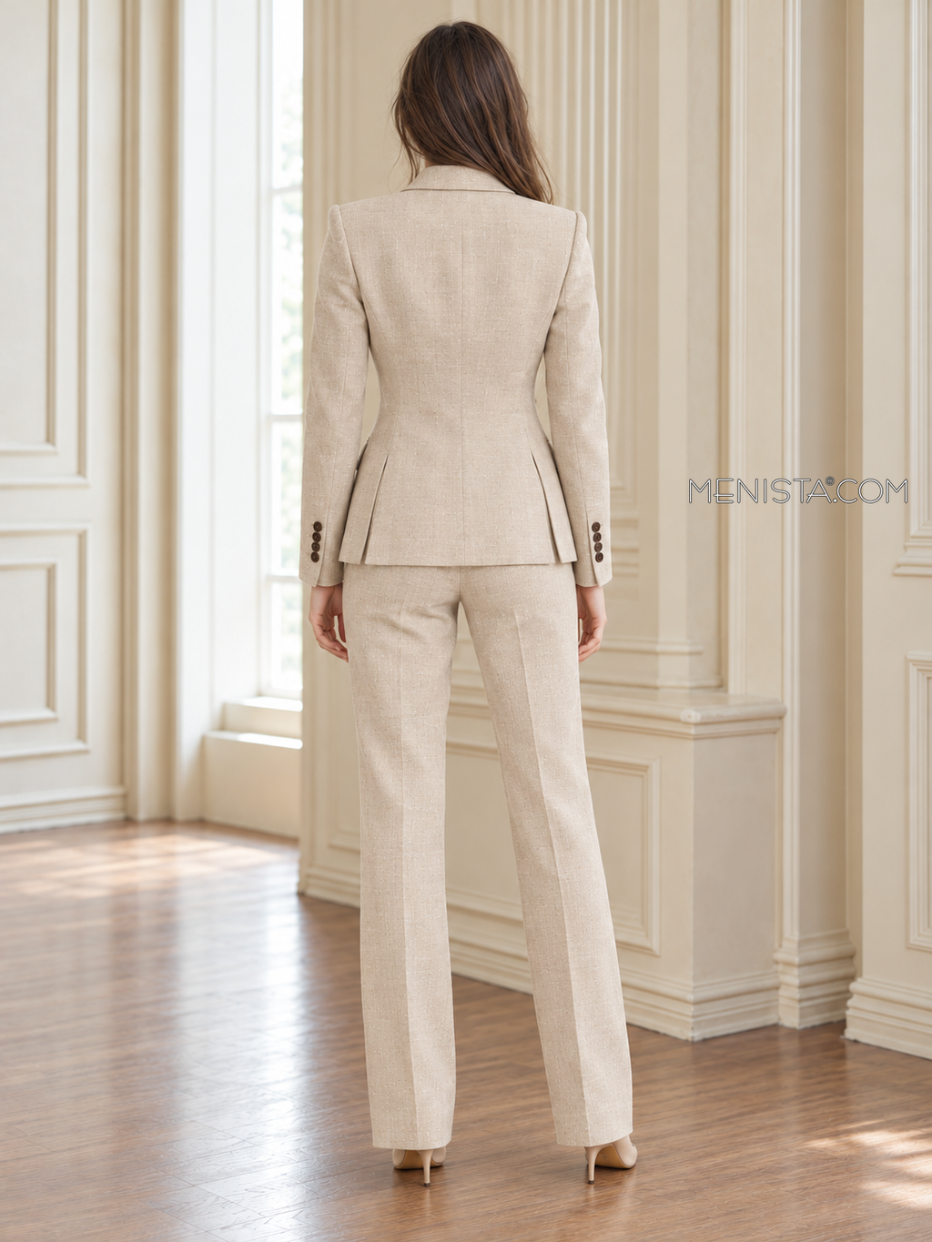 Back of Rhoswen linen jacket showing twin rear vents and matching full-length trousers.