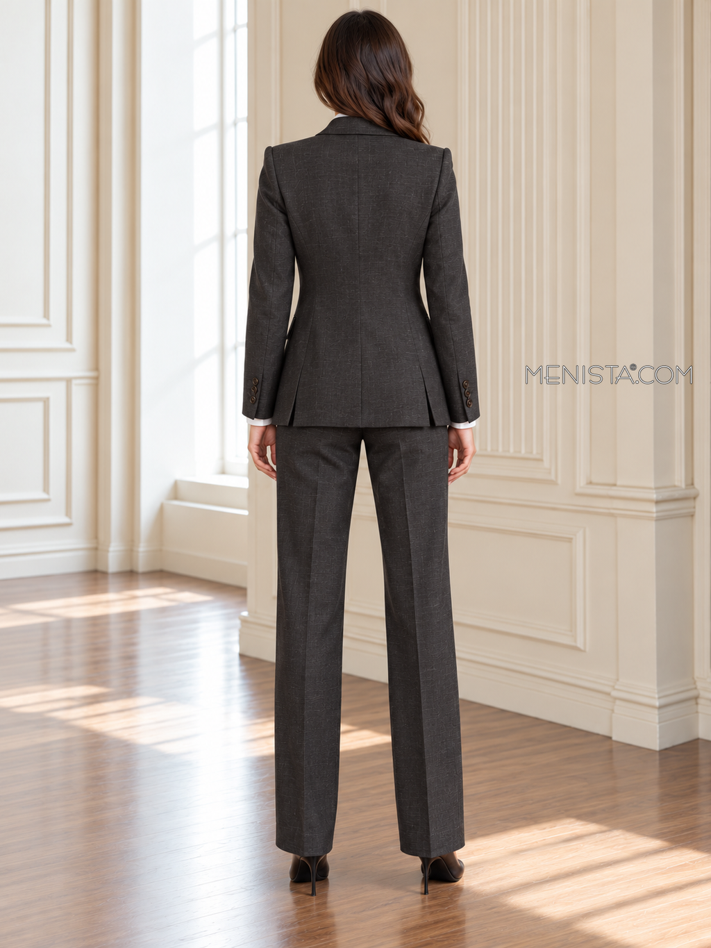 Back of Romilly linen jacket showing twin rear vents and matching full-length trousers.