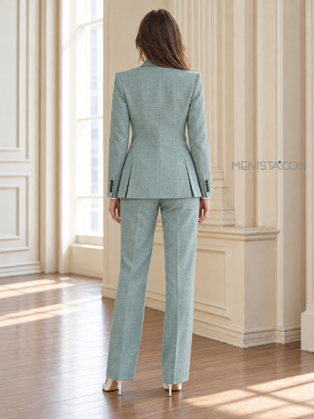 Back of Sancia linen jacket showing twin rear vents and matching full-length trousers.