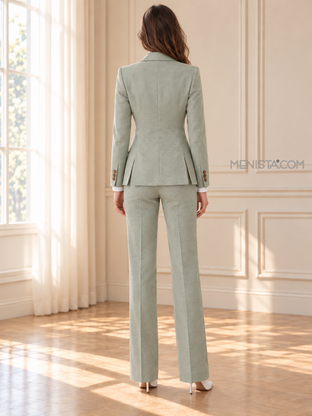 Back of Silvana linen suit showing twin rear jacket vents and matching full-length trousers.
