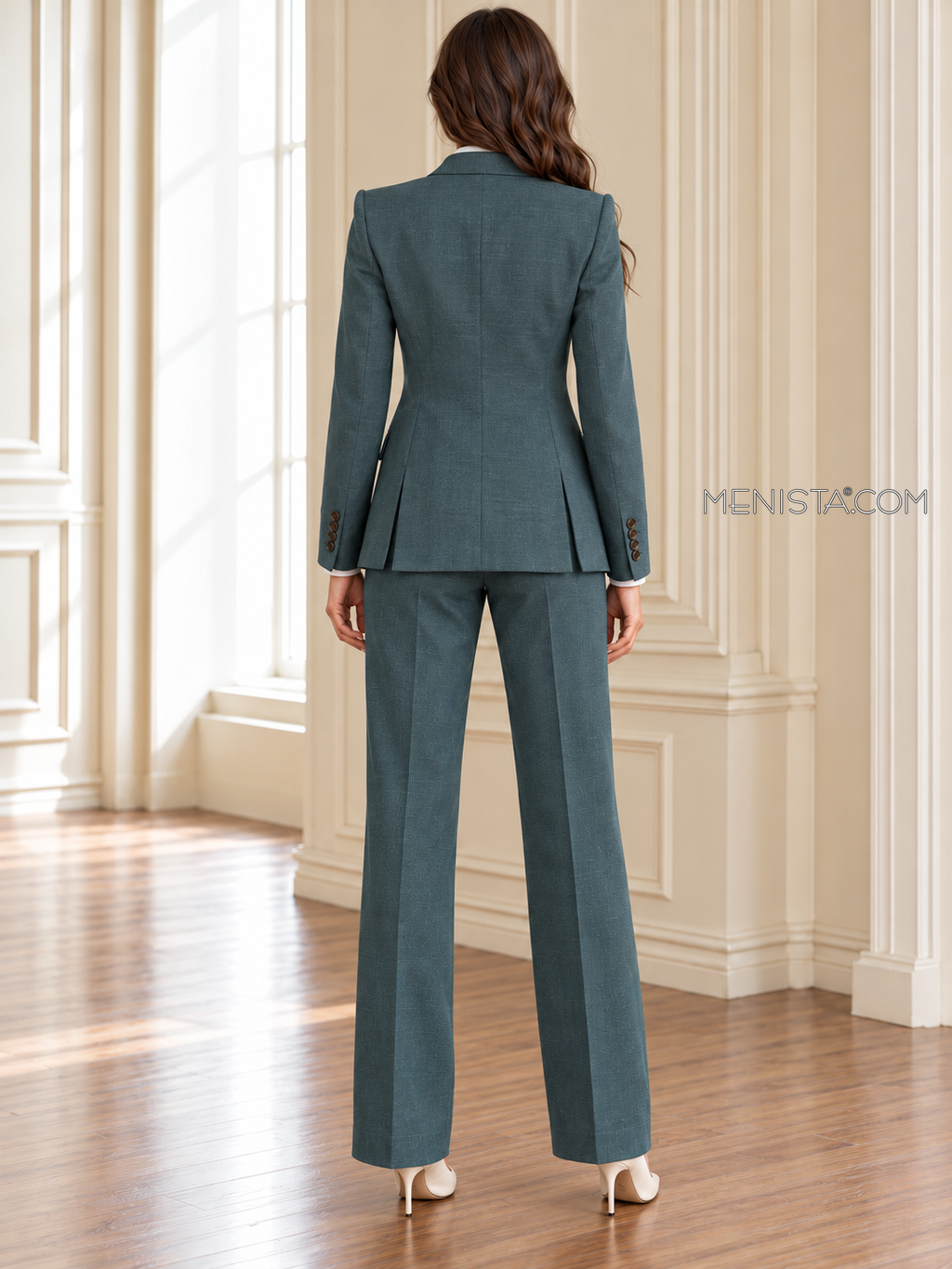 Back of Verena linen jacket showing twin rear vents and matching full-length trousers.