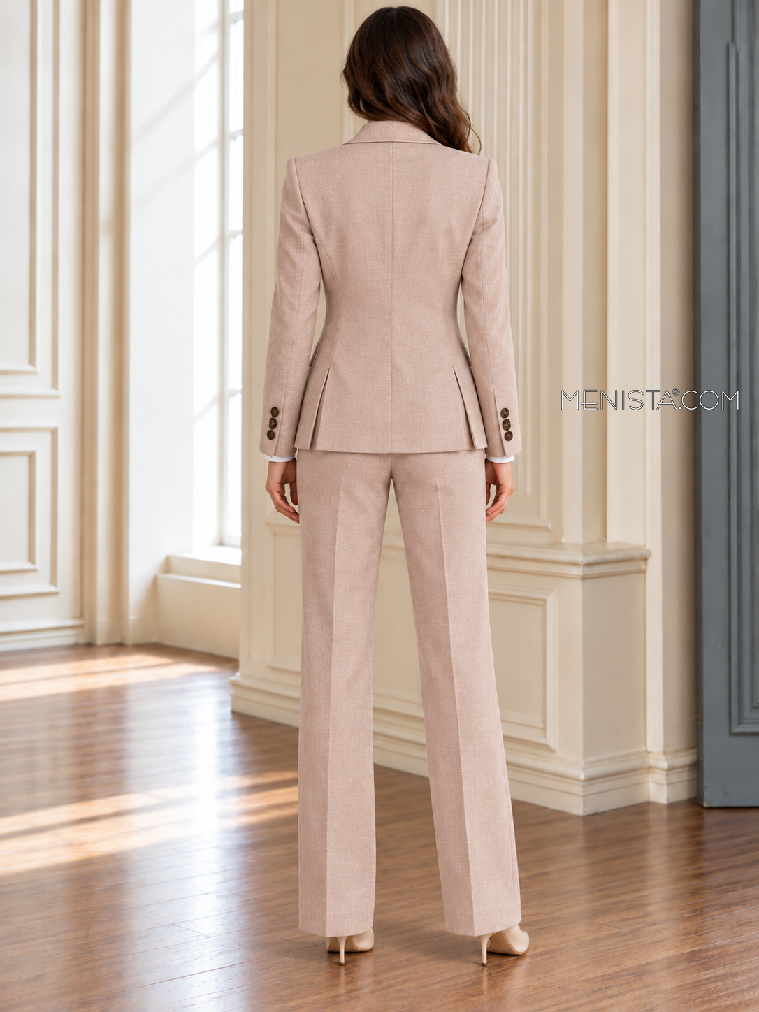 Back of Vittoria linen jacket showing twin rear vents and matching full-length trousers.