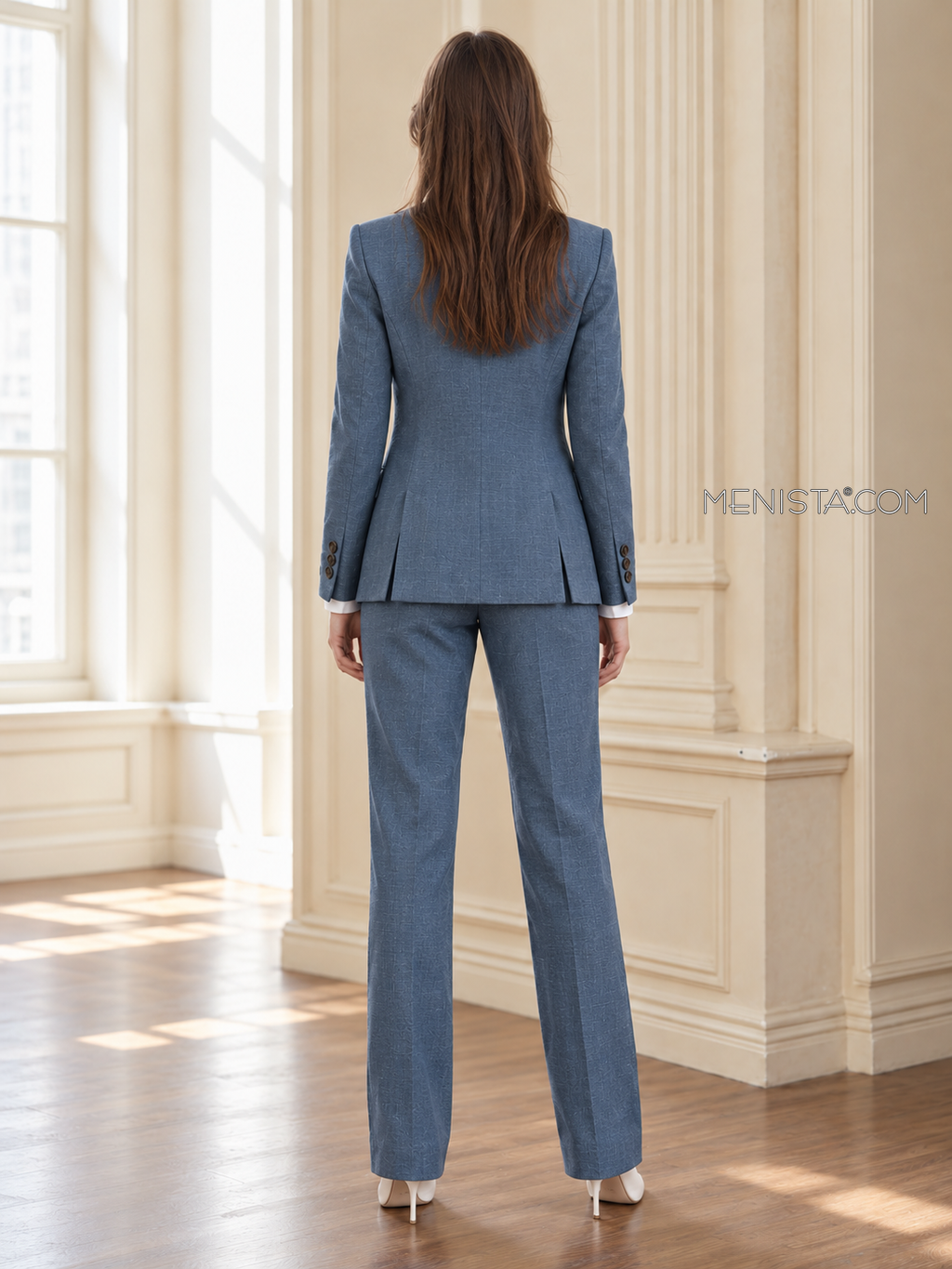 Back of Winifred linen jacket showing twin rear vents and matching full-length trousers.