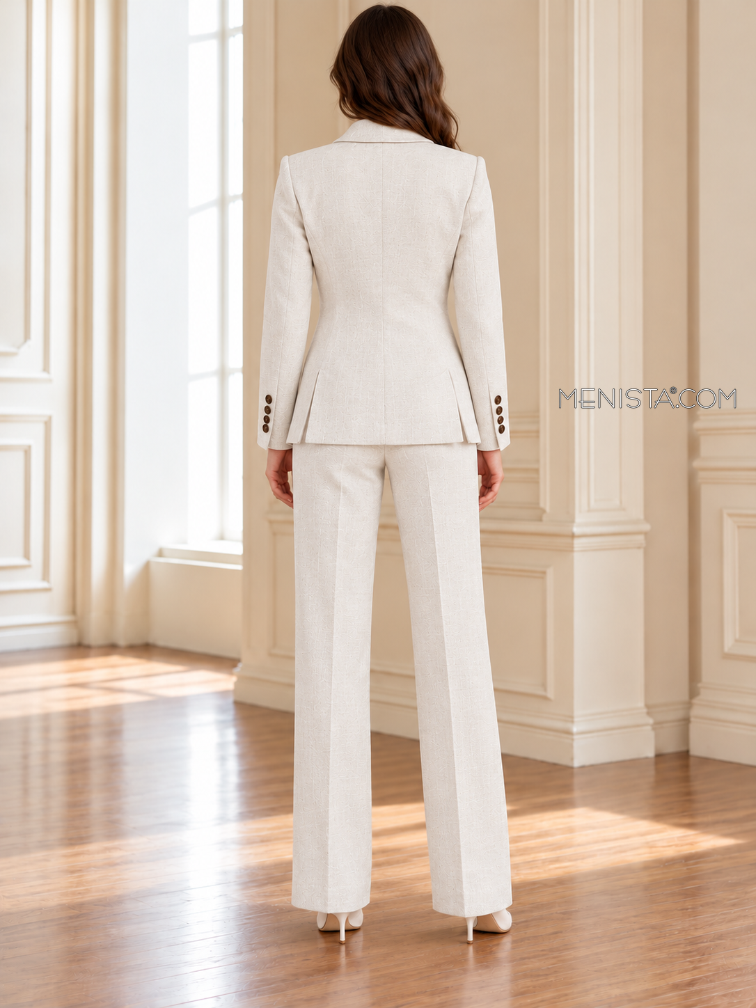 Back of Xanthe linen jacket showing twin rear vents and matching full-length trousers.