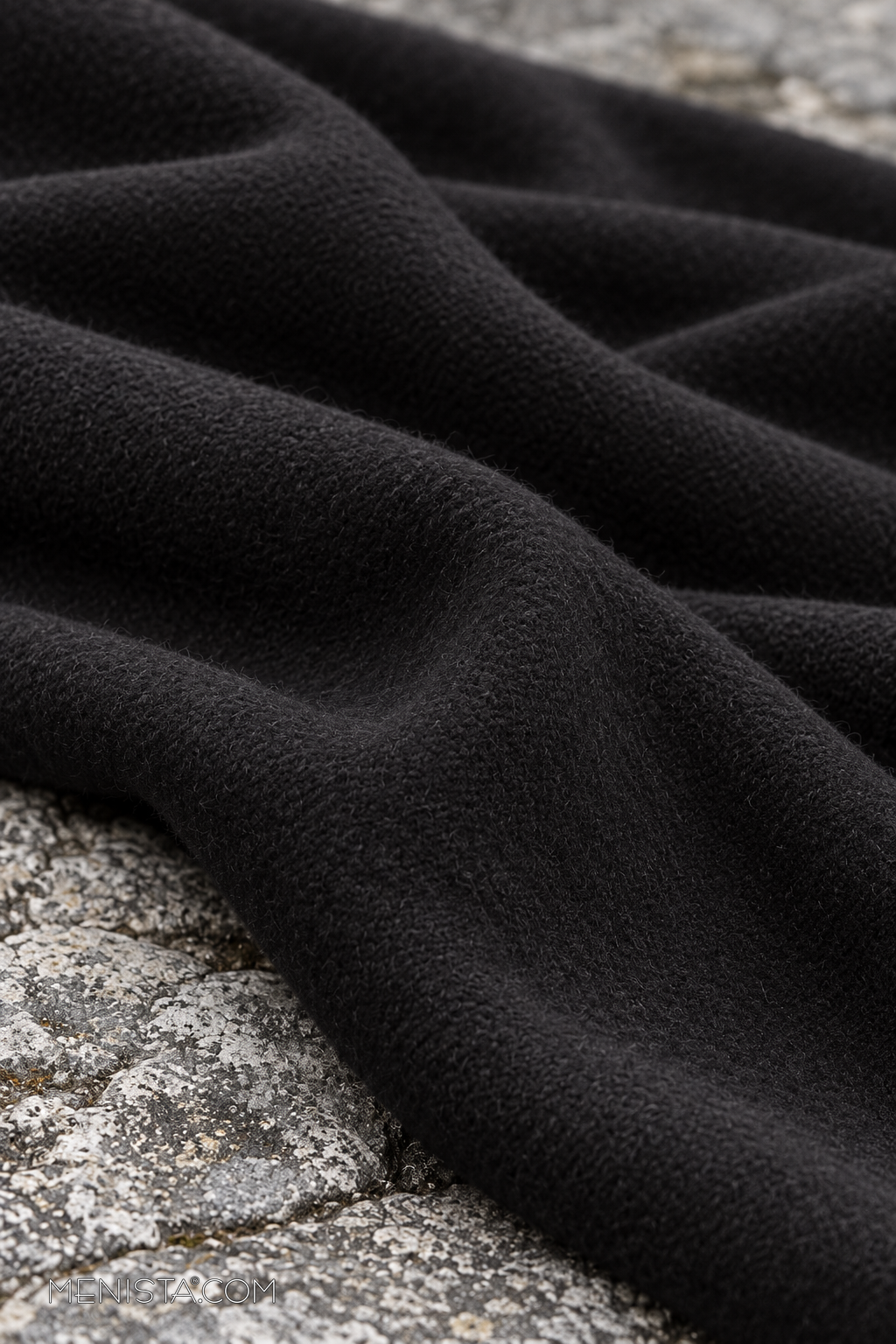 Draped fabric detail of the Valdric Black Wool Blend Double-Breasted Long Coat.
